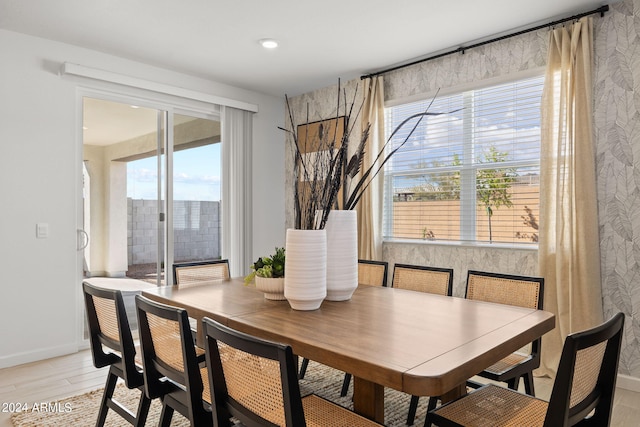 7333 W Buckhorn Trl, Peoria, AZ 85383 - dining area featuring light wood finished floors, baseboards, and recessed lighting