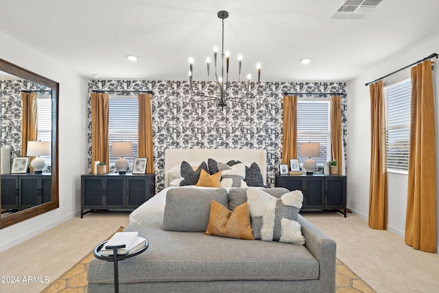 7333 W Buckhorn Trl, Peoria, AZ 85383 - bedroom featuring light colored carpet, a chandelier, baseboards, recessed lighting, and an accent wall