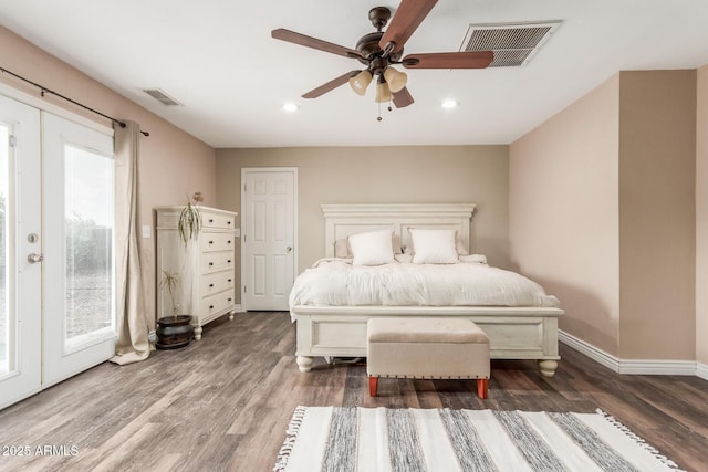 bedroom featuring dark wood-type flooring, ceiling fan, and access to outside