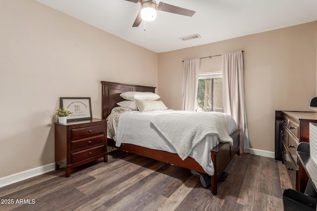 bedroom featuring dark wood-type flooring and ceiling fan