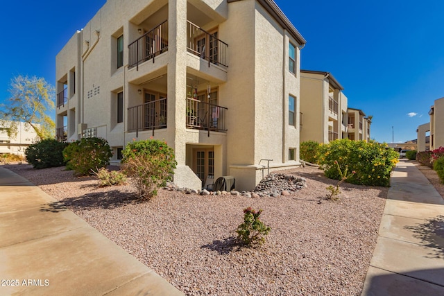 view of building exterior with a residential view