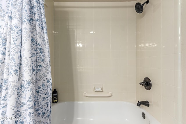 bathroom featuring shower / bath combination with curtain