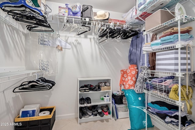 walk in closet featuring tile patterned floors