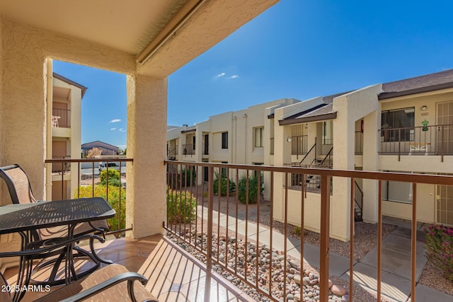 balcony featuring a residential view