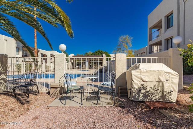 view of patio / terrace with fence