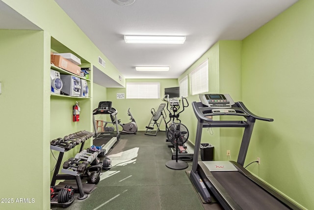 exercise room featuring visible vents