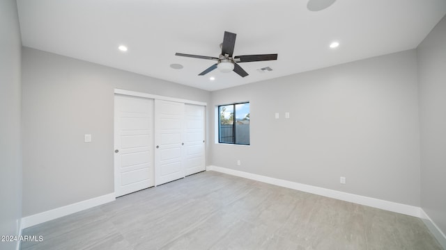 unfurnished bedroom with a closet and ceiling fan