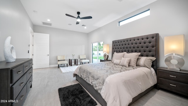 bedroom with ceiling fan and light hardwood / wood-style flooring