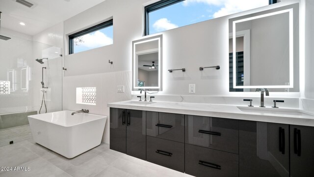 interior details featuring a tile shower