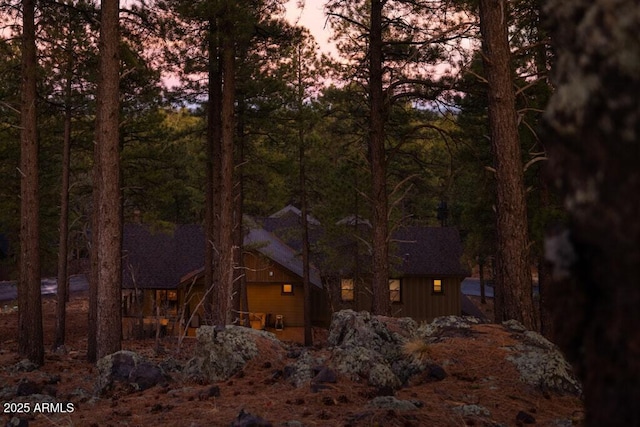 view of property exterior at dusk