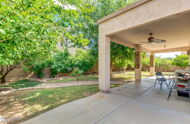 4151 E Campbell Ave, Gilbert, AZ 85234 - view of patio featuring a fenced backyard, ceiling fan, and outdoor dining space