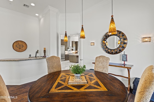 30600 N Pima Rd N Unit 81, Scottsdale, AZ 85266 - dining room with wood finished floors, baseboards, crown molding, and recessed lighting