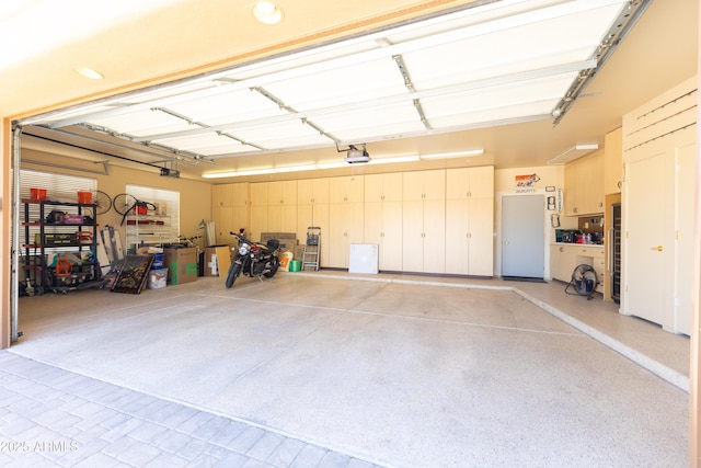 30600 N Pima Rd N Unit 81, Scottsdale, AZ 85266 - garage with a garage door opener and recessed lighting