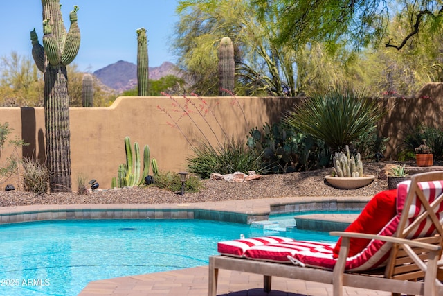 30600 N Pima Rd N Unit 81, Scottsdale, AZ 85266 - view of swimming pool featuring a fenced backyard and a mountain view