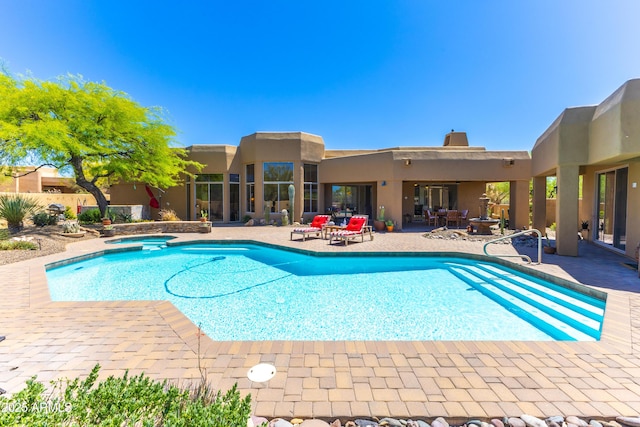 30600 N Pima Rd N Unit 81, Scottsdale, AZ 85266 - view of pool with a patio area and a pool with connected hot tub