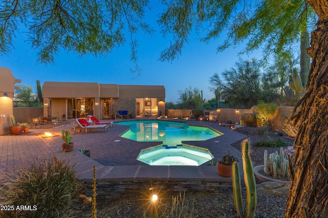 30600 N Pima Rd N Unit 81, Scottsdale, AZ 85266 - view of pool featuring an in-ground hot tub, a patio area, and a fenced backyard