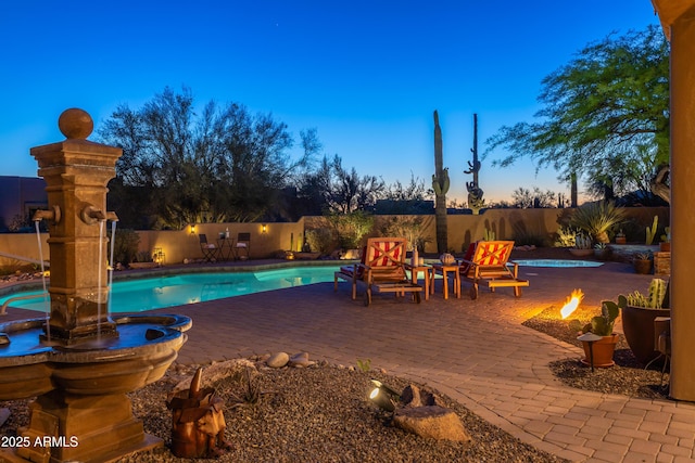 30600 N Pima Rd N Unit 81, Scottsdale, AZ 85266 - view of swimming pool with an outdoor fire pit, a patio, and a fenced backyard