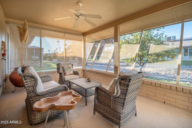 sunroom with ceiling fan