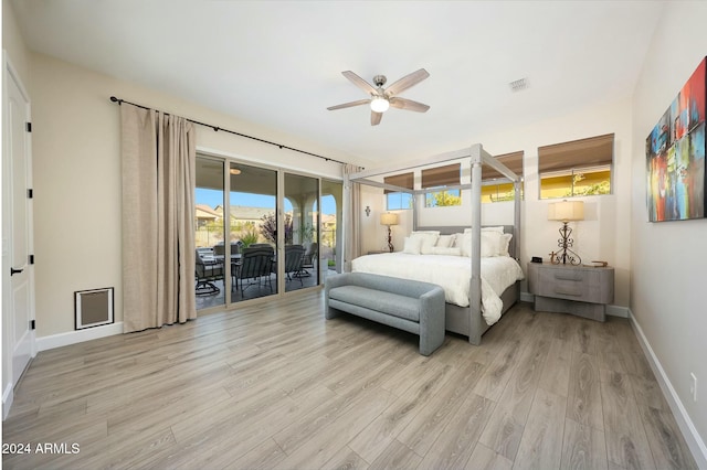 bedroom featuring access to exterior, ceiling fan, and light hardwood / wood-style floors