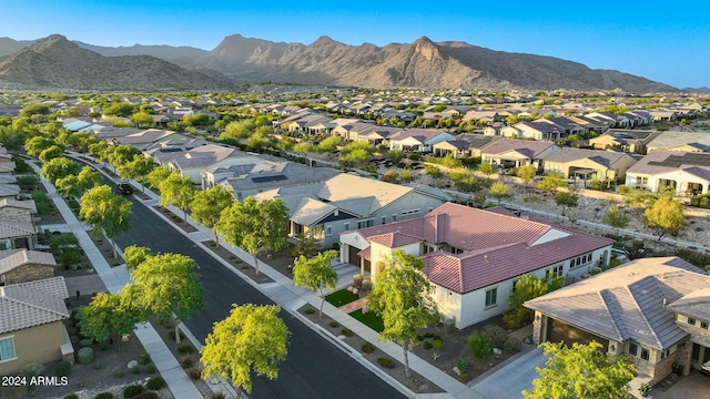 birds eye view of property featuring a mountain view