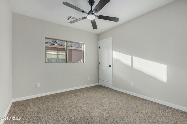 unfurnished room with carpet floors and ceiling fan