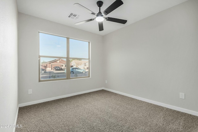 unfurnished room featuring carpet floors and ceiling fan