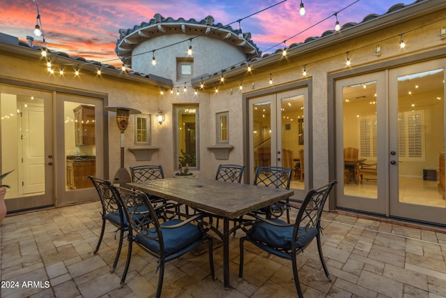 patio terrace at dusk with french doors