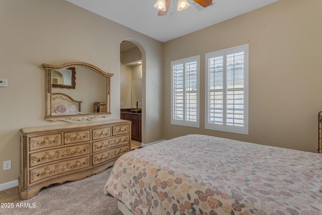 bedroom featuring ceiling fan and light carpet