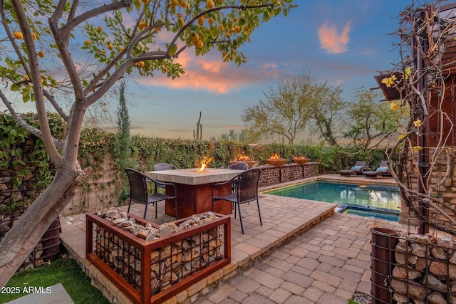 exterior space with a fire pit