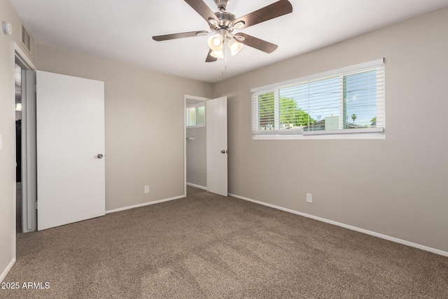 3118 W Aster Dr, Phoenix, AZ 85029 - unfurnished bedroom featuring carpet and a ceiling fan