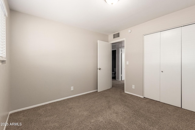 3118 W Aster Dr, Phoenix, AZ 85029 - unfurnished bedroom with carpet and a closet