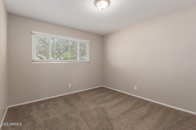3118 W Aster Dr, Phoenix, AZ 85029 - carpeted empty room featuring baseboards