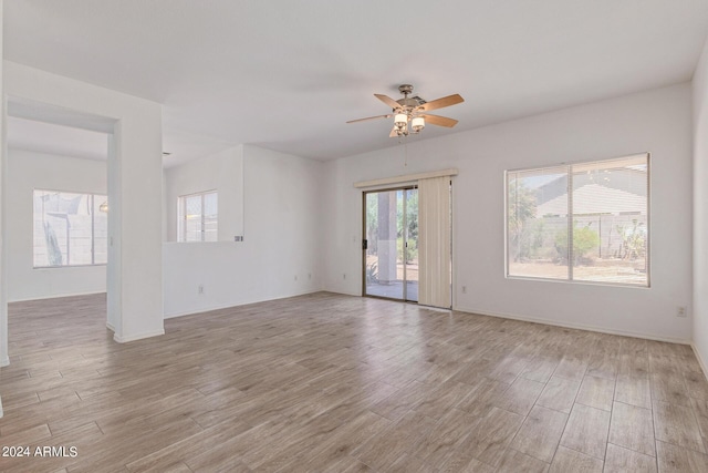 6350 W Hess St, Phoenix, AZ 85043 - empty room with ceiling fan and light wood-type flooring