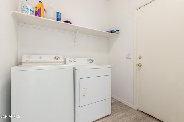 6350 W Hess St, Phoenix, AZ 85043 - laundry room featuring light hardwood / wood-style floors and independent washer and dryer