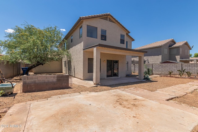 6350 W Hess St, Phoenix, AZ 85043 - rear view of property featuring a patio area