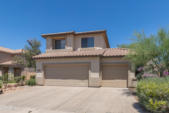6350 W Hess St, Phoenix, AZ 85043 - mediterranean / spanish-style house with a garage