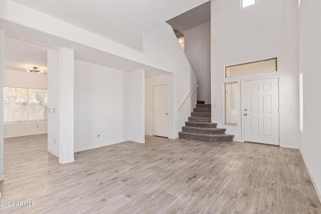 6350 W Hess St, Phoenix, AZ 85043 - interior space with a towering ceiling and light wood-type flooring