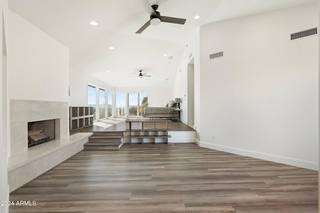 living room with a fireplace and hardwood / wood-style flooring