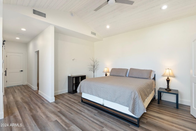 bedroom featuring hardwood / wood-style flooring, vaulted ceiling, ceiling fan, and wooden ceiling