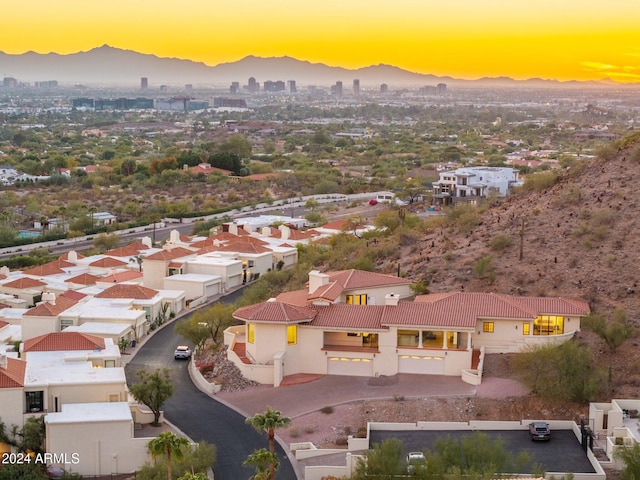 aerial view at dusk with a mountain view