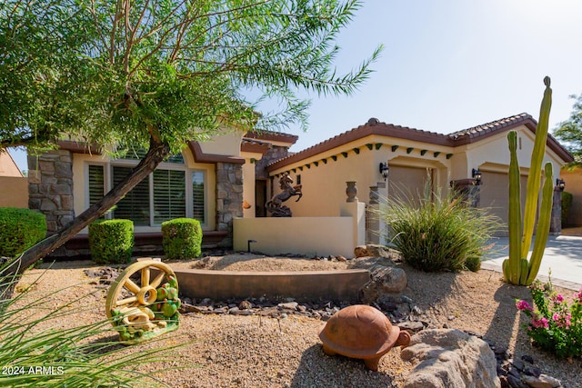 view of front of property with a garage