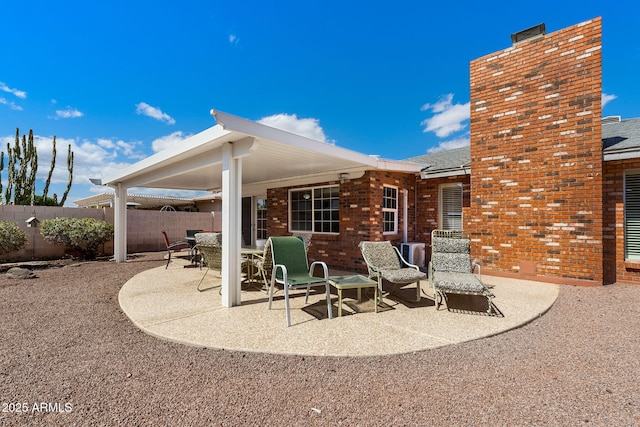 view of patio with fence