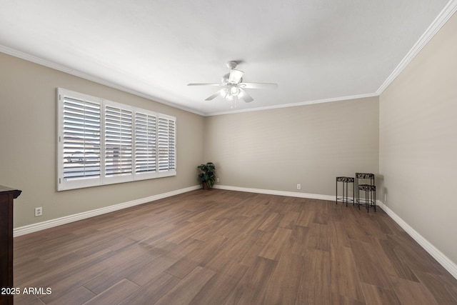 unfurnished room featuring a ceiling fan, crown molding, baseboards, and wood finished floors