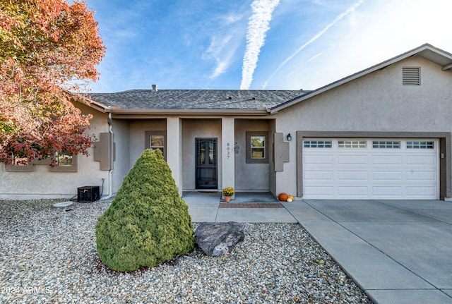 ranch-style house with a garage