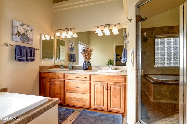 bathroom featuring vanity, tile patterned floors, and independent shower and bath