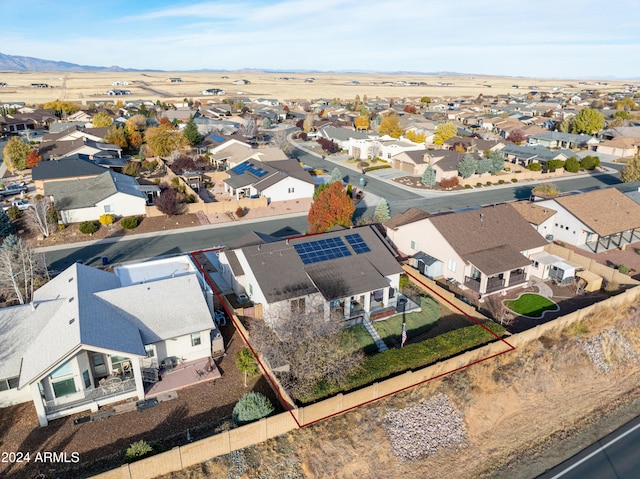 birds eye view of property featuring a mountain view