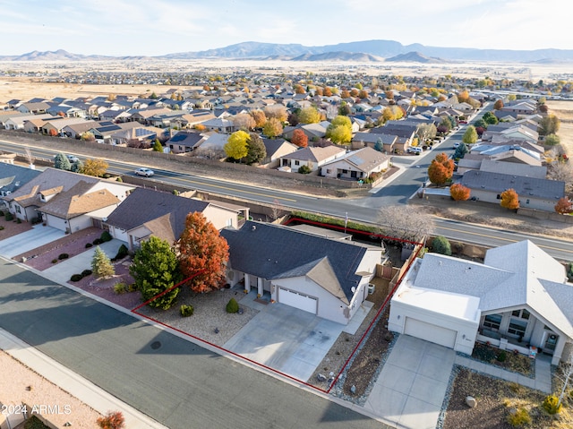 birds eye view of property featuring a mountain view