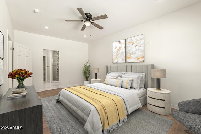 bedroom featuring recessed lighting, baseboards, and wood finished floors