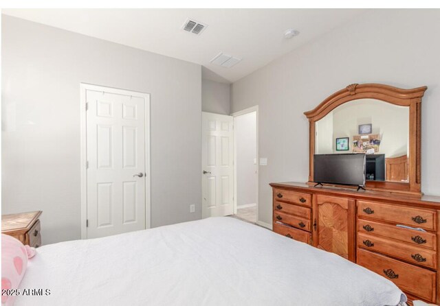 bedroom with visible vents