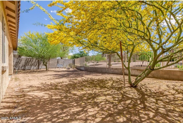 view of yard with a fenced backyard
